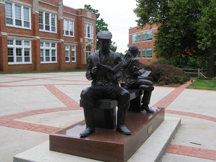 The statue was installed in September 2005 and was funded through $70,000 in donations.  Dick and Phyllis Leet spear-headed the efforts to create the sculpture.